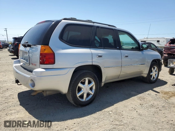 2008 GMC Envoy SLT z VIN 1GKDT13S082103595, wystawiony jako Copart lot #58811845 z przebiegiem 146 779 mil mil oraz Szkoda całkowita • Salvage title. Historia ofert i sprzedaży dostępna na DreamBid. Obrazek 3.