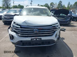 2024 Volkswagen Atlas SE z VIN 1V2HR2CA7RC532493, wystawiony jako IAAI lot #41970251 z przebiegiem 32 124 mil mil oraz . Historia ofert i sprzedaży dostępna na DreamBid. Obrazek 12.