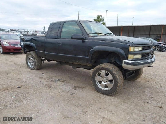1998 Chevrolet C/K 1500 with VIN 2GCEK19R9W1115619, listed as a IAAI auction lot 41153966 with 165,098 mi miles. Bid and sale history available at carsss.com. Image 1.