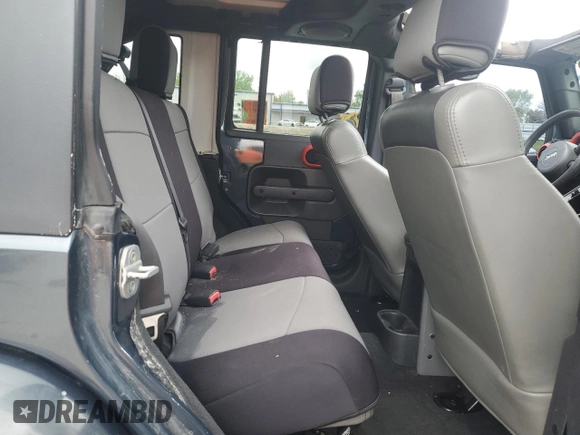2007 Jeep Wrangler Unlimited Sahara with VIN 1J4GB59177L226122, listed as a Copart auction lot 55529575 with 208,811 mi miles and Salvage title. Bid and sale history available at DreamBid. Image 10.
