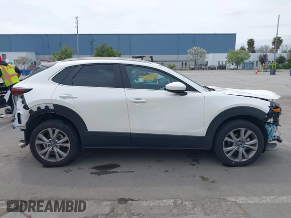 2023 Mazda CX-30 S Carbon Edition with VIN 3MVDMBCM0PM569100, listed as a IAAI auction lot 41978191 with 20,470 mi miles and . Bid and sale history available at DreamBid. Image 14.