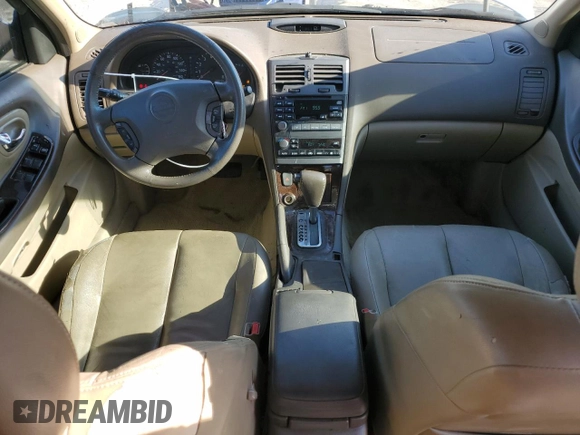 2001 Nissan Maxima SE 20th Anniversary. z VIN JN1CA31A81T313061, wystawiony jako Copart lot #72608504 z przebiegiem 200 484 mil mil oraz Szkoda całkowita • Salvage title. Historia ofert i sprzedaży dostępna na DreamBid. Obrazek 8.