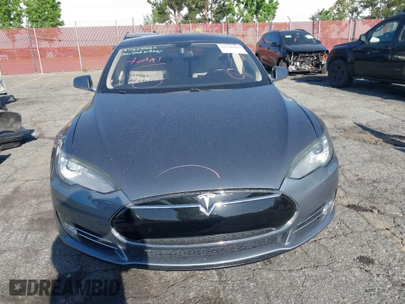 2014 Tesla Model S 60 with VIN 5YJSA1S11EFP35998, listed as a IAAI auction lot 42316563 with 83,835 mi miles and . Bid and sale history available at DreamBid. Image 13.