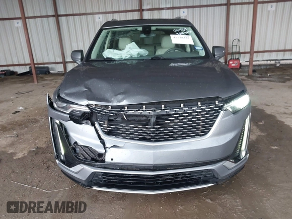 2022 Cadillac XT6 Premium Luxury z VIN 1GYKPDRS1NZ108012, wystawiony jako IAAI lot #41178333 z przebiegiem 83 987 mil mil oraz . Historia ofert i sprzedaży dostępna na DreamBid. Obrazek 12.