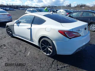 2013 Hyundai Genesis Coupe Grand Touring with VIN KMHHU6KJ7DU096543, listed as a IAAI auction lot 33714958 with 129,768 mi miles and . Bid and sale history available at DreamBid. Image 3.