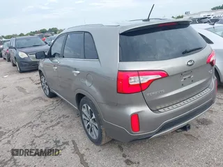 2014 Kia Sorento SX Limited with VIN 5XYKW4A73EG503792, listed as a IAAI auction lot 42684390 with 129,021 mi miles and . Bid and sale history available at DreamBid. Image 3.