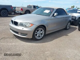 2009 BMW 1 Series 128i with VIN WBAUL73529VJ74898, listed as a IAAI auction lot 42690194 with 134,407 mi miles and . Bid and sale history available at DreamBid. Image 2.