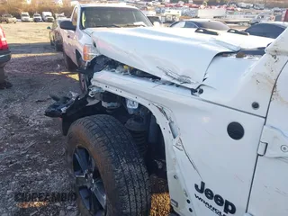 2021 Jeep Wrangler Unlimited Sahara with VIN 1C4HJXEG1MW597905, listed as a IAAI auction lot 41327138 with Not provided miles and . Bid and sale history available at DreamBid. Image 19.