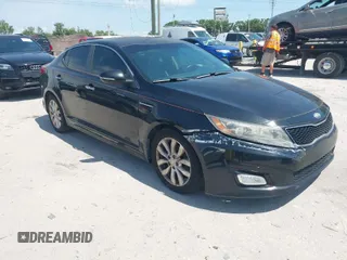 2014 Kia Optima EX with VIN 5XXGN4A72EG294381, listed as a IAAI auction lot 41944473 with 119,781 mi miles and . Bid and sale history available at carsss.com. Image 1.