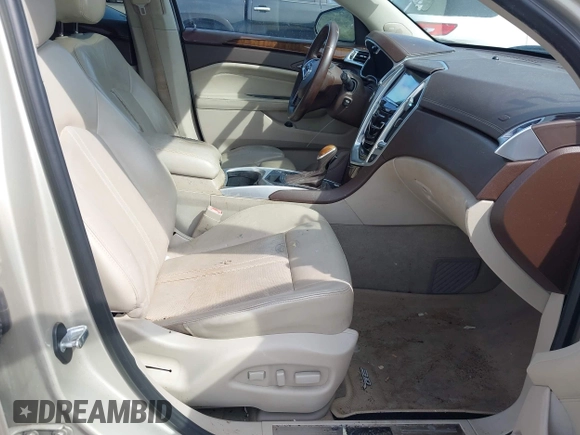 2013 Cadillac SRX Luxury Collection with VIN 3GYFNCE3XDS632366, listed as a IAAI auction lot 42231784 with 85,591 mi miles and . Bid and sale history available at DreamBid. Image 5.