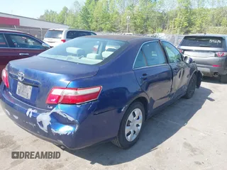 2009 Toyota Camry with VIN 4T1BE46K59U401572, listed as a IAAI auction lot 42059793 with 215,238 mi miles. Bid and sale history available at carsss.com. Image 4.