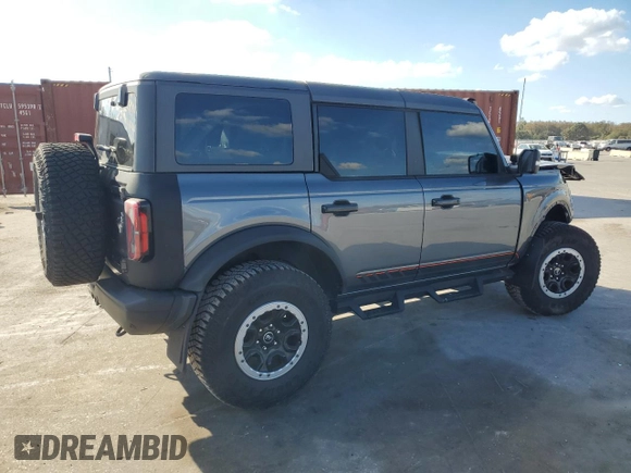 2022 Ford Bronco with VIN 1FMEE5DH1NLB82717, listed as a Copart auction lot 83230614 with 21,593 mi miles and Salvage Title. Bid and sale history available at DreamBid. Image 3.