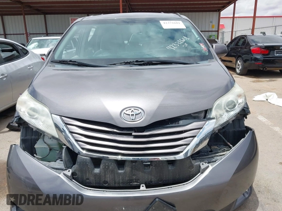 2015 Toyota Sienna LE AAS with VIN 5TDKK3DC8FS531431, listed as a IAAI auction lot 42372601 with 63,633 mi miles and . Bid and sale history available at DreamBid. Image 13.