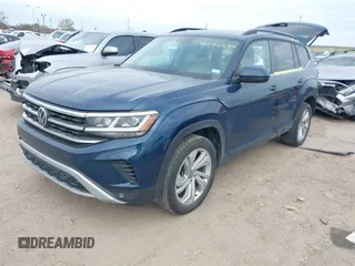 2021 Volkswagen Atlas SE z VIN 1V2JR2CA3MC555490, wystawiony jako IAAI lot #41286240 z przebiegiem 89 435 mil mil oraz . Historia ofert i sprzedaży dostępna na DreamBid. Obrazek 2.