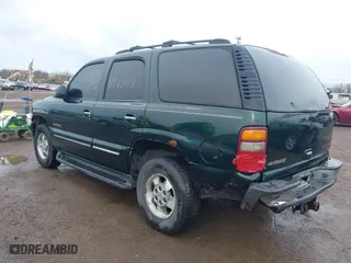 2002 Chevrolet Tahoe LT with VIN 1GNEK13Z22J154097, listed as a IAAI auction lot 41913119 with 243,978 mi miles. Bid and sale history available at carsss.com. Image 3.
