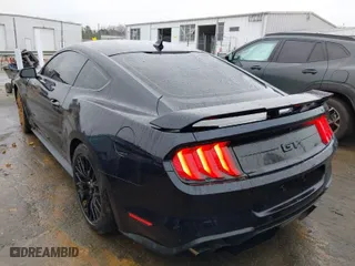 2021 Ford Mustang GT with VIN 1FA6P8CFXM5106832, listed as a IAAI auction lot 41512413 with 22,171 mi miles. Bid and sale history available at carsss.com. Image 3.