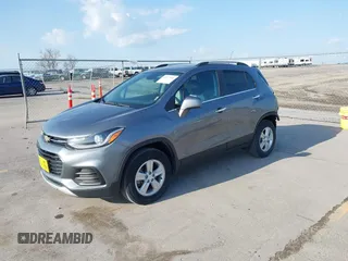 2020 Chevrolet Trax LT with VIN 3GNCJPSB7LL150297, listed as a IAAI auction lot 42077006 with 77,381 mi miles and . Bid and sale history available at DreamBid. Image 2.