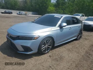 2022 Honda Civic Touring with VIN 2HGFE1F99NH002583, listed as a Copart auction lot 59785805 with Not provided miles and Salvage title. Bid and sale history available at DreamBid. Image 1.