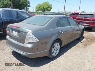 2010 Ford Fusion SE with VIN 3FAHP0HA0AR352188, listed as a IAAI auction lot 42004772 with 227,687 mi miles. Bid and sale history available at carsss.com. Image 4.