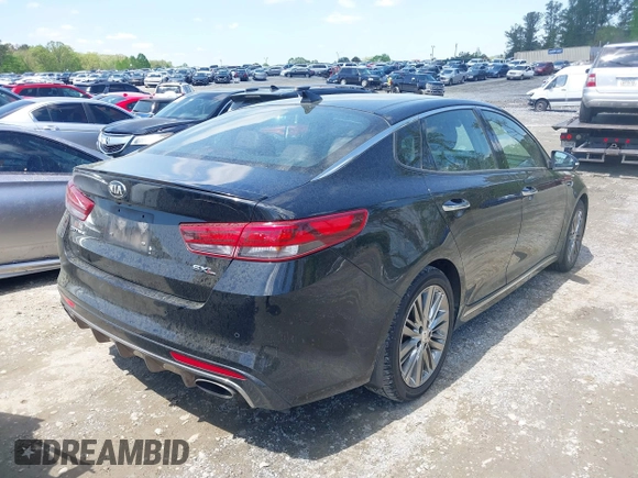 2016 Kia Optima SXL Turbo with VIN 5XXGV4L23GG117486, listed as a IAAI auction lot 41998300 with 142,477 mi miles. Bid and sale history available at carsss.com. Image 4.