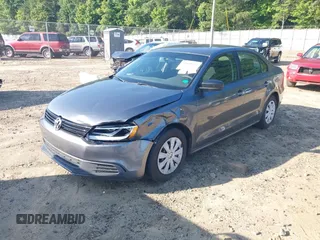 2014 Volkswagen Jetta S z VIN 3VW2K7AJ3EM303858, wystawiony jako IAAI lot #42449072 z przebiegiem 171 959 mil mil oraz . Historia ofert i sprzedaży dostępna na DreamBid. Obrazek 6.