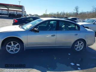 2003 Nissan Altima S with VIN 1N4AL11D63C321486, listed as a IAAI auction lot 41581386 with 200,082 mi miles. Bid and sale history available at carsss.com. Image 14.