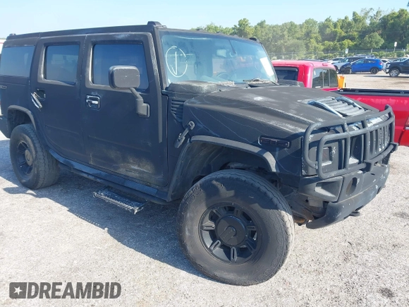 2003 Hummer H2 z VIN 5GRGN23UX3H140510, wystawiony jako IAAI lot #42325527 z przebiegiem 140 010 mil mil oraz . Historia ofert i sprzedaży dostępna na DreamBid. Obrazek 1.