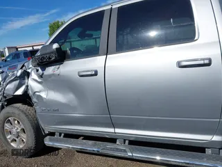 2021 Ram 2500 Big Horn with VIN 3C6UR5DJ5MG600500, listed as a IAAI auction lot 42338348 with 119,115 mi miles and . Bid and sale history available at DreamBid. Image 14.