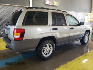 2004 Jeep Grand Cherokee Laredo z VIN 1J4GW48S24C327184, wystawiony jako Copart lot #53702515 z przebiegiem 151 411 mil mil oraz Czysty tytuł • Clean title. Historia ofert i sprzedaży dostępna na DreamBid. Obrazek 3.