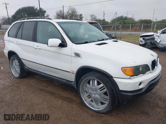 2002 BMW X5 3.0i with VIN 5UXFA53542LV72703, listed as a IAAI auction lot 41636879 with 1 mi miles. Bid and sale history available at carsss.com. Image 1.