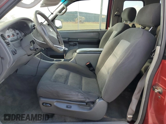 2003 Ford Explorer Sport XLS z VIN 1FMZU70EX3UA38795, wystawiony jako Copart lot #78794334 z przebiegiem 193 925 mil mil oraz Szkody całkowita. Historia ofert i sprzedaży dostępna na DreamBid. Obrazek 7.