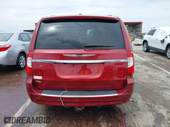 2012 Chrysler Town & Country Touring with VIN 2C4RC1BG8CR344068, listed as a IAAI auction lot 41970494 with 130,559 mi miles. Bid and sale history available at carsss.com. Image 16.