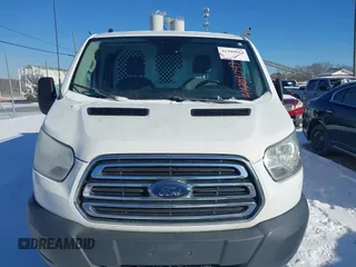 2016 Ford Transit Cargo with VIN 1FTYR1ZM6GKA70265, listed as a IAAI auction lot 41209043 with 156,112 mi miles and . Bid and sale history available at DreamBid. Image 6.