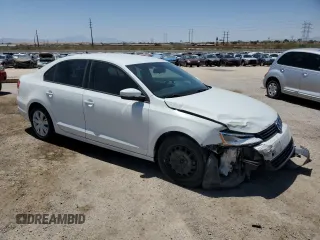 2014 Volkswagen Jetta SE with VIN 3VWD17AJ0EM267333, listed as a Copart auction lot 57684255 with 130,141 mi miles and Salvage title. Bid and sale history available at DreamBid. Image 4.