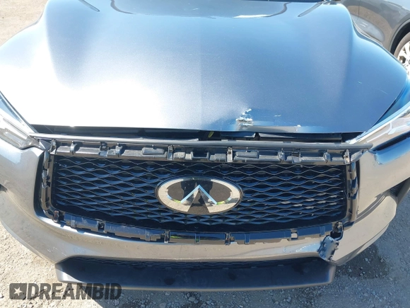 2021 Infiniti QX50 Luxe z VIN 3PCAJ5BA2MF111323, wystawiony jako IAAI lot #42218711 z przebiegiem 27 864 mil mil oraz . Historia ofert i sprzedaży dostępna na DreamBid. Obrazek 6.