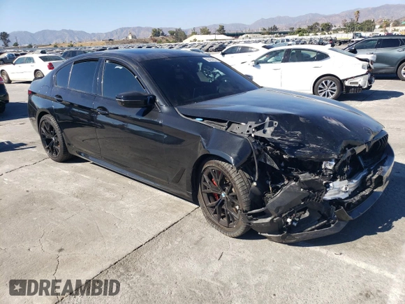 2023 BMW 5 Series M550i xDrive with VIN WBA13BK03PCM44838, listed as a Copart auction lot 68434874 with 17,798 mi miles and Salvage title. Bid and sale history available at DreamBid. Image 4.