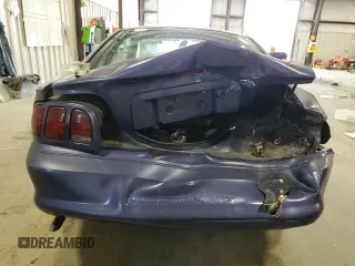 1996 Ford Mustang z VIN 1FALP4047TF185562, wystawiony jako Copart lot #55995745 z przebiegiem 154 906 mil mil oraz Szkoda całkowita • Salvage title. Historia ofert i sprzedaży dostępna na DreamBid. Obrazek 6.
