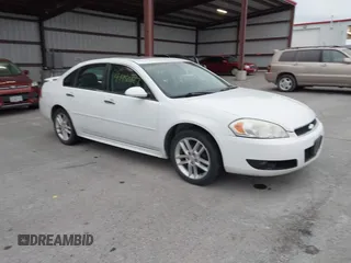2013 Chevrolet Impala LTZ with VIN 2G1WC5E37D1223897, listed as a IAAI auction lot 41950823 with 165,237 mi miles and . Bid and sale history available at DreamBid. Image 1.