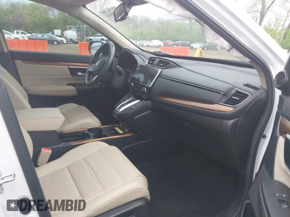 2020 Honda CR-V Touring with VIN 7FART6H9XLE024742, listed as a IAAI auction lot 42120164 with 32,213 mi miles and . Bid and sale history available at DreamBid. Image 5.