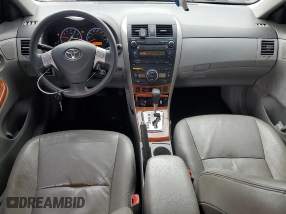 2010 Toyota Corolla with VIN 1NXBU4EE0AZ211178, listed as a Copart auction lot 59043055 with 182,374 mi miles and Salvage title. Bid and sale history available at DreamBid. Image 8.