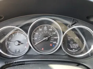 2014 Mazda CX-5 Sport with VIN JM3KE2BE7E0334880, listed as a Copart auction lot 61780635 with 96,926 mi miles and Salvage title. Bid and sale history available at DreamBid. Image 9.