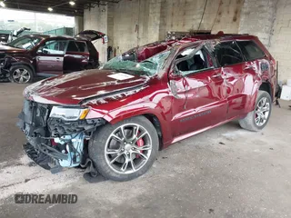 2018 Jeep Grand Cherokee SRT z VIN 1C4RJFDJ0JC231510, wystawiony jako IAAI lot #42445896 z przebiegiem 85 000 mil mil oraz . Historia ofert i sprzedaży dostępna na DreamBid. Obrazek 2.
