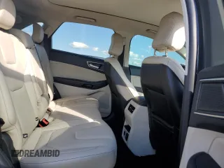 2021 Ford Edge Titanium z VIN 2FMPK3K96MBA54764, wystawiony jako Copart lot #55593715 z przebiegiem 49 729 mil mil oraz Szkoda całkowita • Salvage title. Historia ofert i sprzedaży dostępna na DreamBid. Obrazek 10.