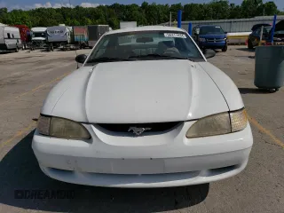 1996 Ford Mustang with VIN 1FALP4041TF206244, listed as a Copart auction lot 56311934 with 123,572 mi miles and Salvage Title. Bid and sale history available at carsss.com. Image 5.