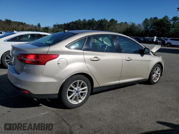 2018 Ford Focus SE with VIN 1FADP3F23JL219189, listed as a Copart auction lot 52209335 with 101,180 mi miles and Salvage title. Bid and sale history available at DreamBid. Image 3.