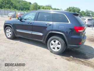 2011 Jeep Grand Cherokee Laredo with VIN 1J4RR4GG2BC550934, listed as a IAAI auction lot 42467947 with 198,904 mi miles and . Bid and sale history available at DreamBid. Image 3.