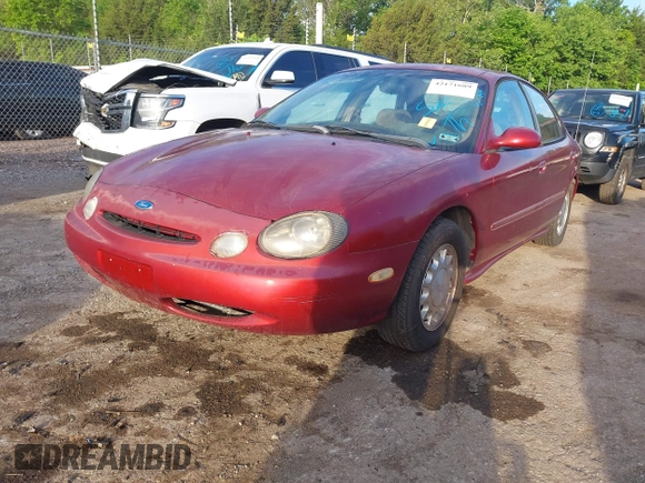 1996 Ford Taurus LX with VIN 1FALP53S2TA311839, listed as a IAAI auction lot 42171689 with 150,116 mi miles and . Bid and sale history available at DreamBid. Image 2.