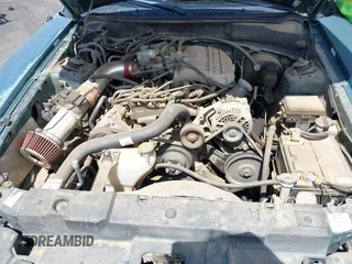 1997 Ford Mustang with VIN 1FALP4049VF200422, listed as a IAAI auction lot 42073947 with 157,937 mi miles. Bid and sale history available at carsss.com. Image 10.