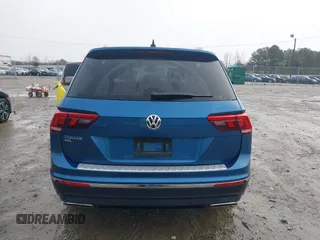 2020 Volkswagen Tiguan SE z VIN 3VV3B7AX5LM176136, wystawiony jako IAAI lot #41564431 z przebiegiem 74 867 mil mil oraz . Historia ofert i sprzedaży dostępna na DreamBid. Obrazek 16.