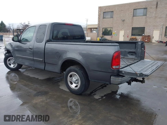 2003 Ford F-150 XL with VIN 1FTRX17W03NB51687, listed as a IAAI auction lot 41712022 with 183,428 mi miles. Bid and sale history available at carsss.com. Image 3.